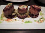 Diver scallops on top of zucchini cakes